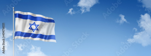 Fotografi Israeli flag isolated on a blue sky. Horizontal banner