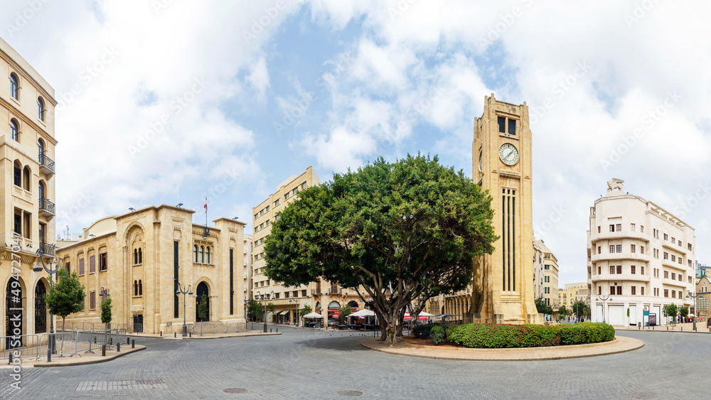 Naklejka premium Nejmeh square in downtown Beirut with the iconic clock tower and the Lebanese parliament building, Beirut, Lebanon