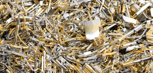 industrial gold waste from electronic components. background photo