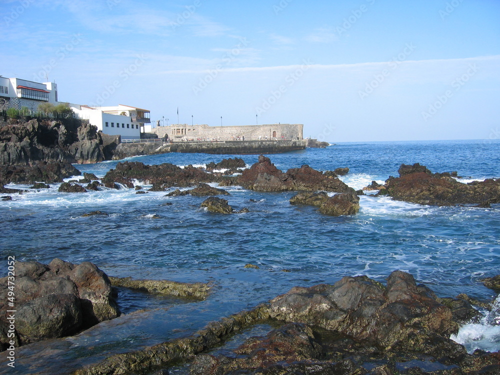 Beautiful image of the Canarian coast with a magnificent breakwater