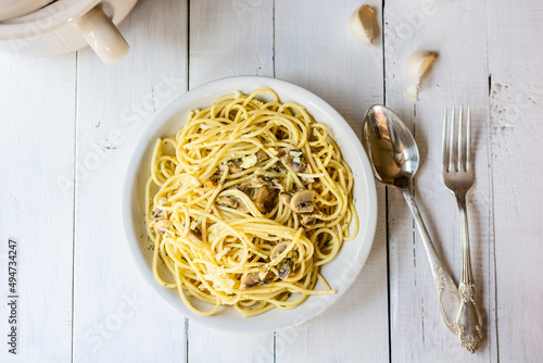 Mushroom pasta on white table 