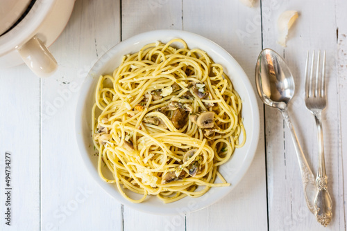 Mushroom pasta on white table 
