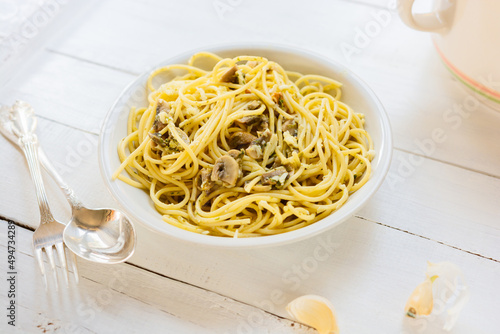 Mushroom pasta on white table 