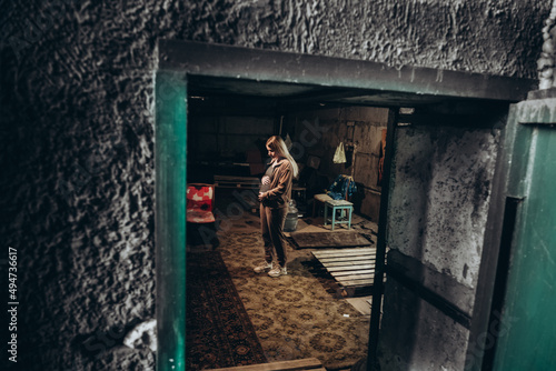 War in Ukraine. A Ukrainian pregnant woman hides in a bomb shelter while resisting a Russian invasion. © sushytska