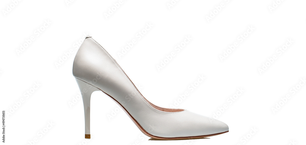 White shoe for women. Beauty and fashion concept. Fashionable women shoes isolated on white background. White high heel women shoes on white background White shoe for women. Beauty and fashion concept. Fashionable women shoes isolated on white background. White high heel women shoes on white background
