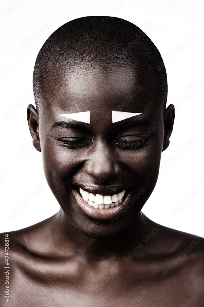 Beauty is found in the simplest form. Shot of a beautiful woman smiling against a white studio background. Beauty is found in the simplest form. Shot of a beautiful woman smiling against a white studio background.