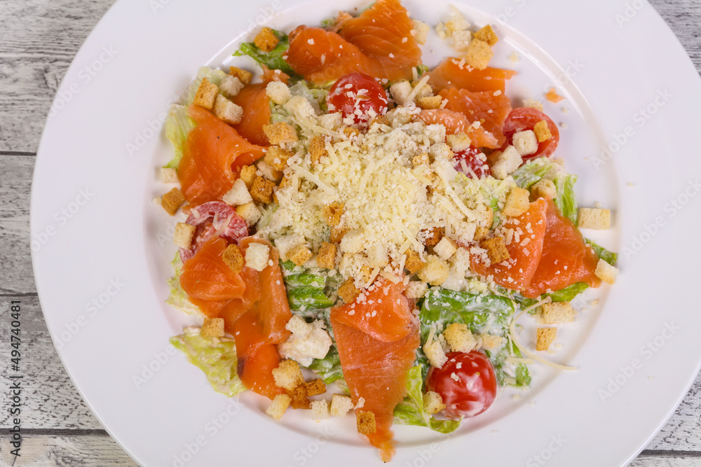 Caesar salad with salmon and parmesan Caesar salad with salmon and parmesan