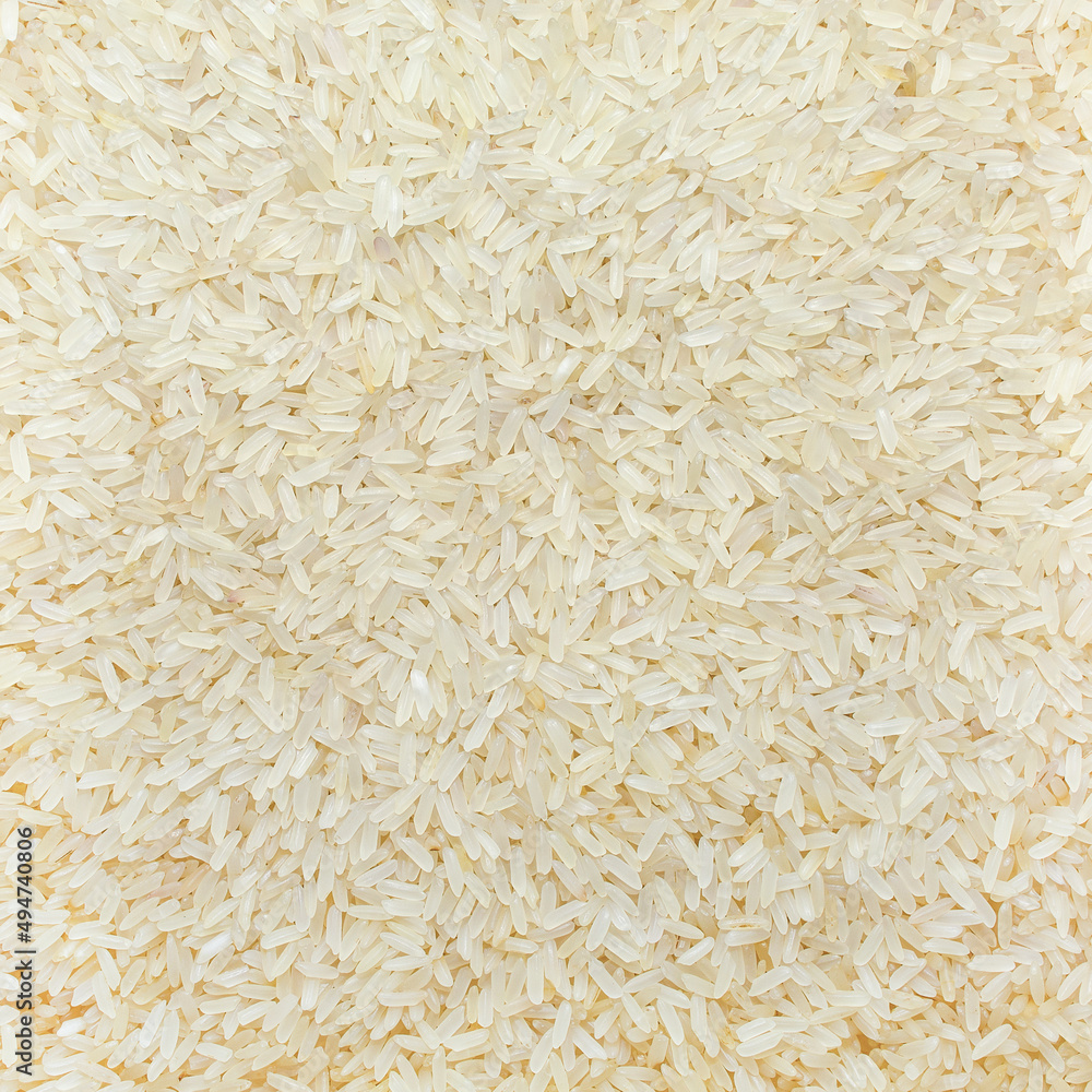 Photo of closeup texture of white rice cereals, background Photo of closeup texture of white rice cereals, background