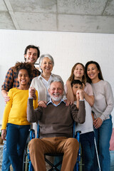 Extended multiethnic diverse family with children,grandparents and parents having fun together