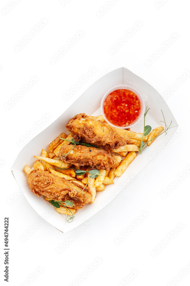 strips with french fries and sauce strips with french fries and sauce