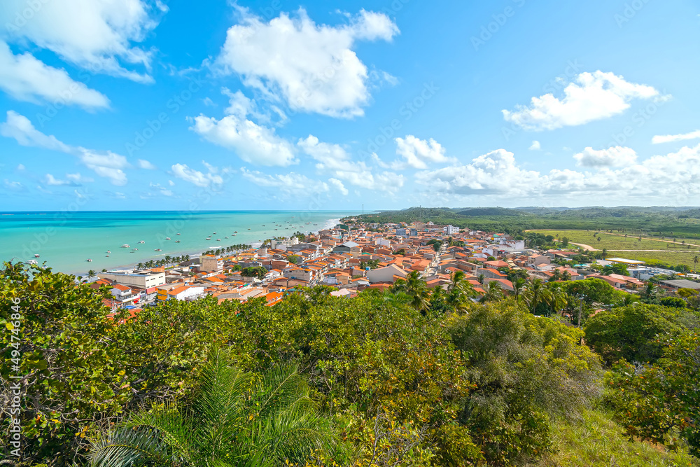 Aerial view of Maragogi, AL, Brazil. Landscape of the city and the Maragogi beach, famous tourist destination of the brazilian coast.