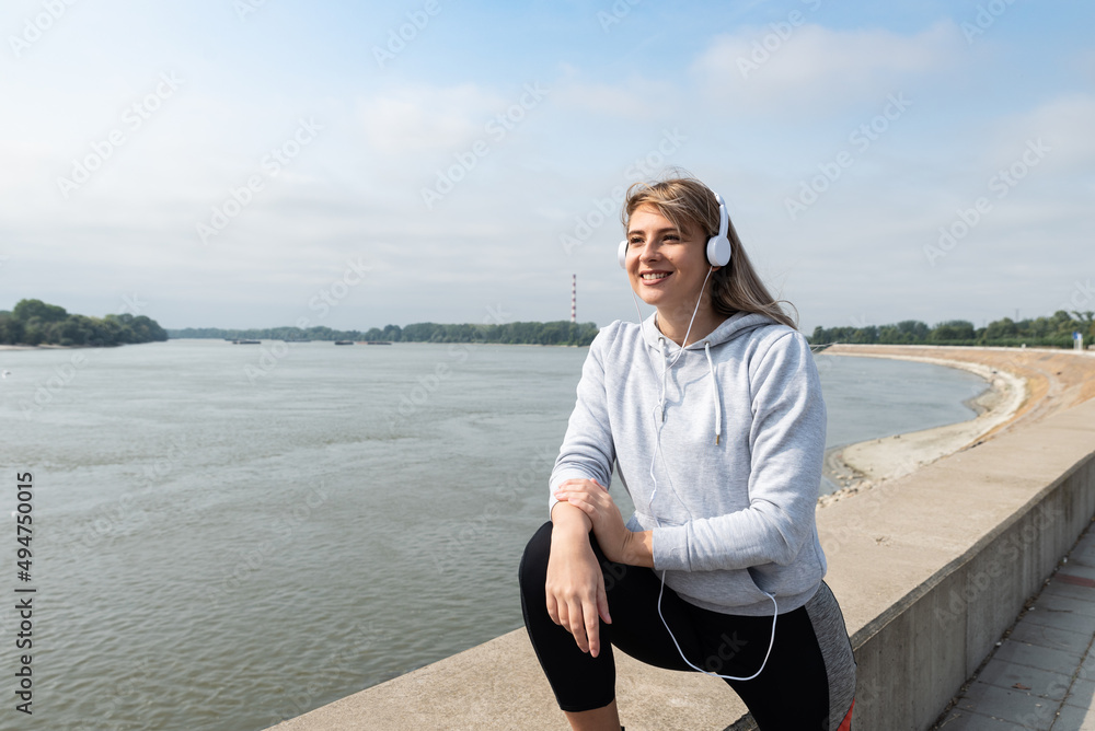 Young active sporty business woman morning routine of exercising outdoor before she go to the work at office. Self loved female workout training for healthy life. Young active sporty business woman morning routine of exercising outdoor before she go to the work at office. Self loved female workout training for healthy life.