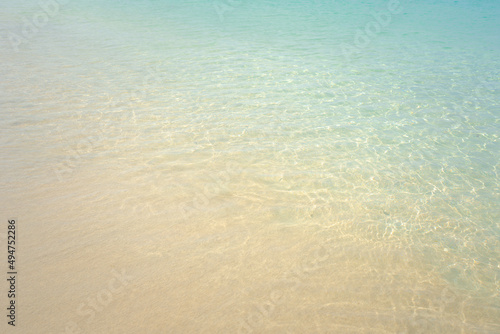 Beautiful beach and small waves .