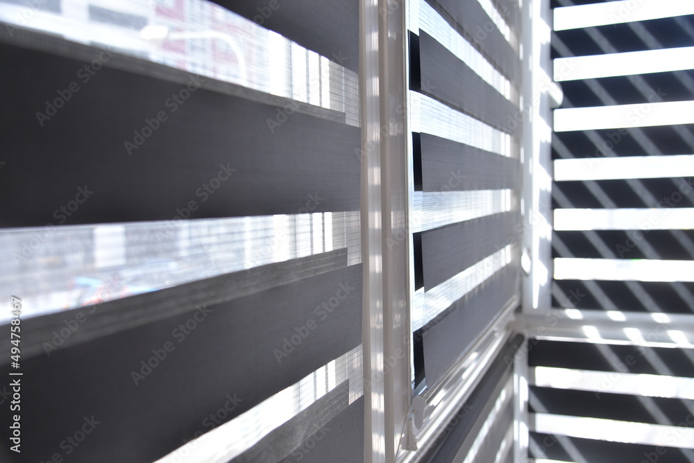 Fototapeta premium sunlight breaks through the blinds