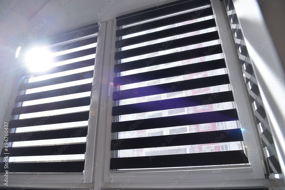 sunlight breaks through the blinds sunlight breaks through the blinds