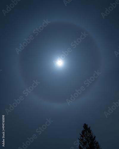 Fototapeta Naklejka Na Ścianę i Meble -  Moon Halo - Ring, glowing light around the moon