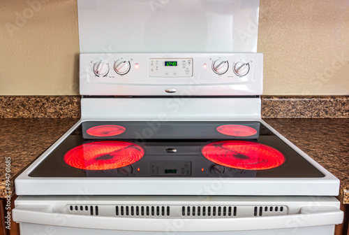 Glass electric stove with burners on