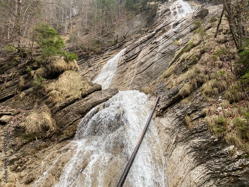 Waterfall at Schrähbach (Schraehbach) or Schrähbachfall (Schraehbachfall) waterfall near alpine Lake Wägitalersee (Waegitalersee), Innerthal - Canton of Schwyz, Switzerland (Schweiz) photo