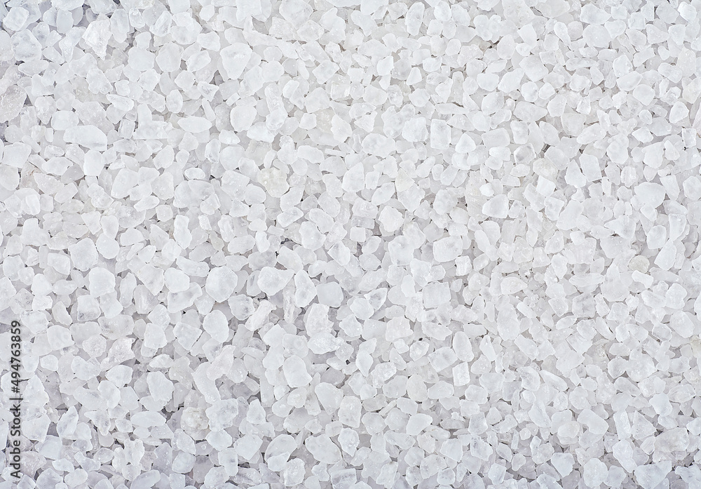 Crystal of sea salt, as background. White marine rock salt, top view. Crystal of sea salt, as background. White marine rock salt, top view.