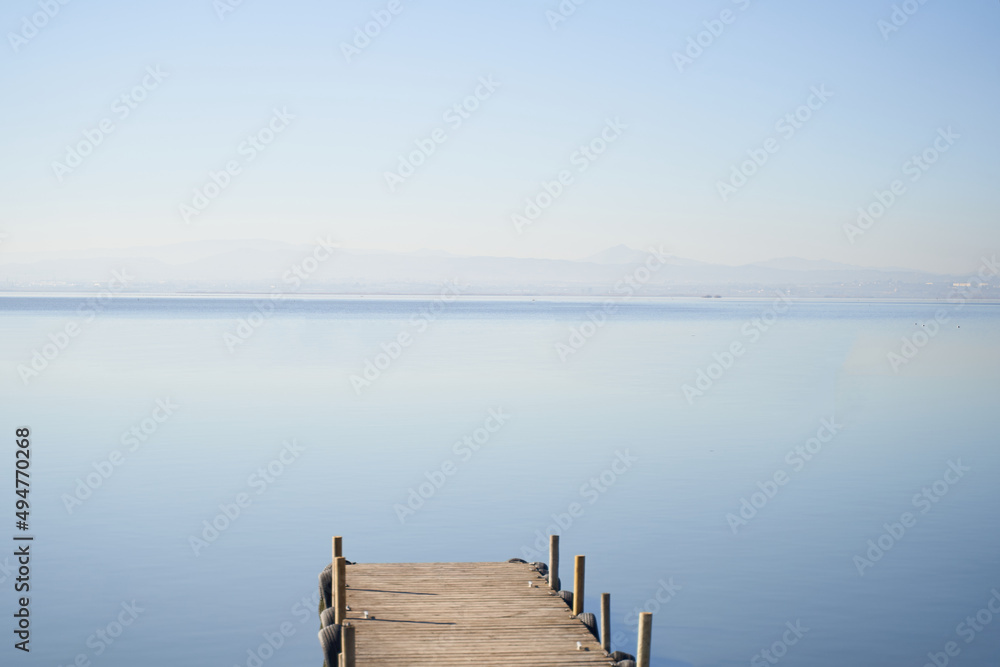 Wooden dock boy L'albufera lake in Spain