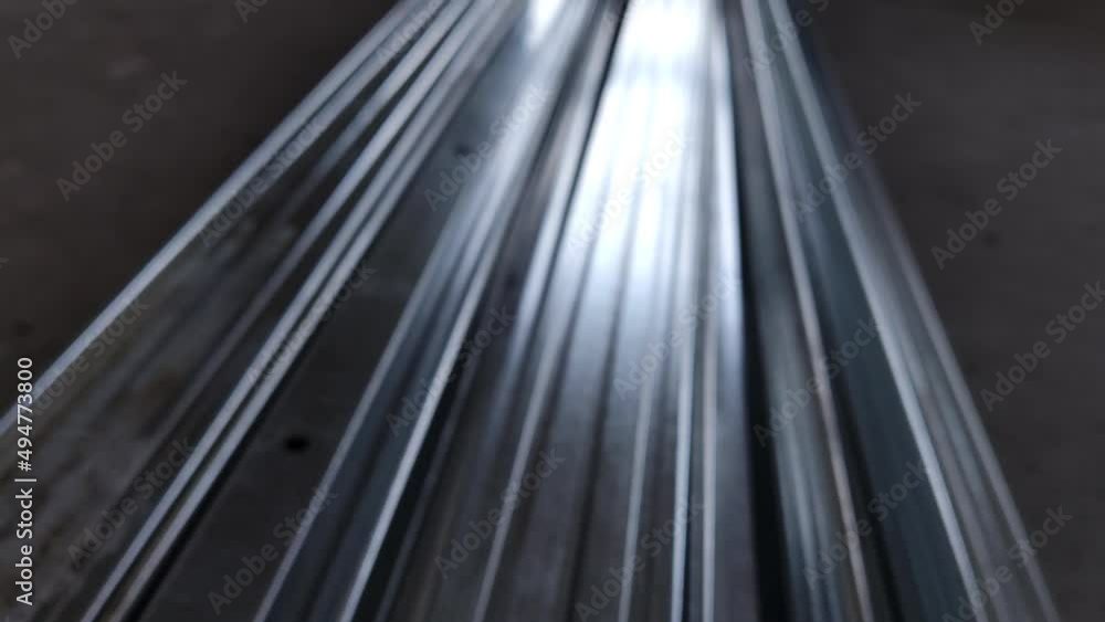 Metal profiles. Stack of stainless steel pipes in warehouse. Rolled metal products. Economic Metals list prices index. Financial crisis. Wall building parts. Metal profiles. Stack of stainless steel pipes in warehouse. Rolled metal products. Economic Metals list prices index. Financial crisis. Wall building parts.