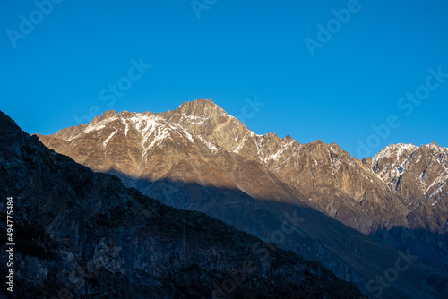 Mountain ridge against blue sky