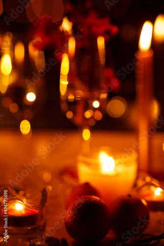 romantic evening with candles  champagne and tangerines