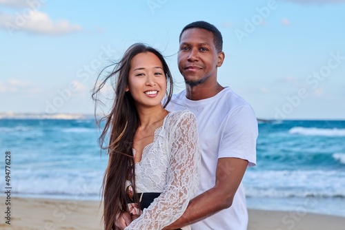 Beautiful young couple in love on the beach
