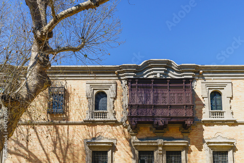 Facade of the Pavilion of Peru with a wooden balcony in the city of Seville, in Spain photo