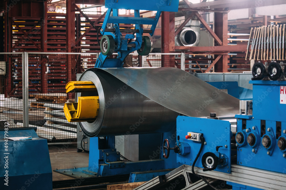 Fototapeta premium Roll of galvanized steel sheet at metalworking production line