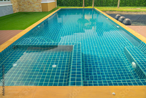 Beautiful swimming pool in the garden.Beautiful swimming pool design. © oneSHUTTER oneMEMORY