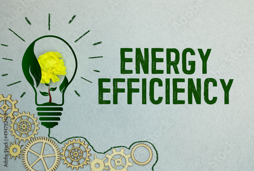 Ecological concept. On a white-green background lies a pen, a leaf of a plant