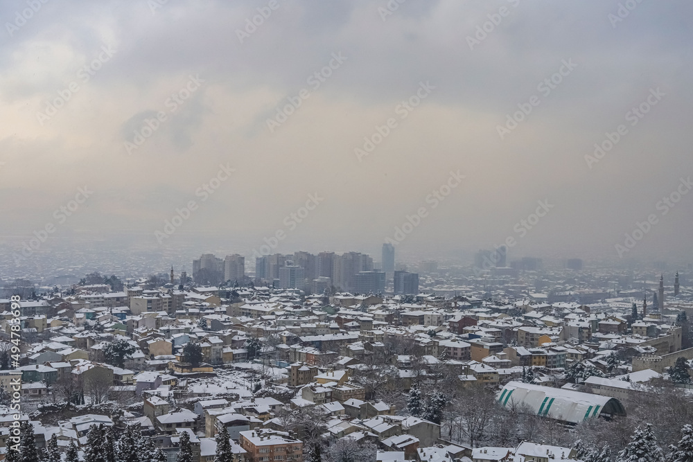 General view of a snowed city