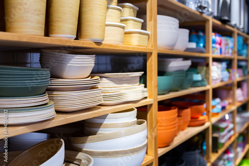 Store selling pastel color bowls, dishes, cups on tableware shop