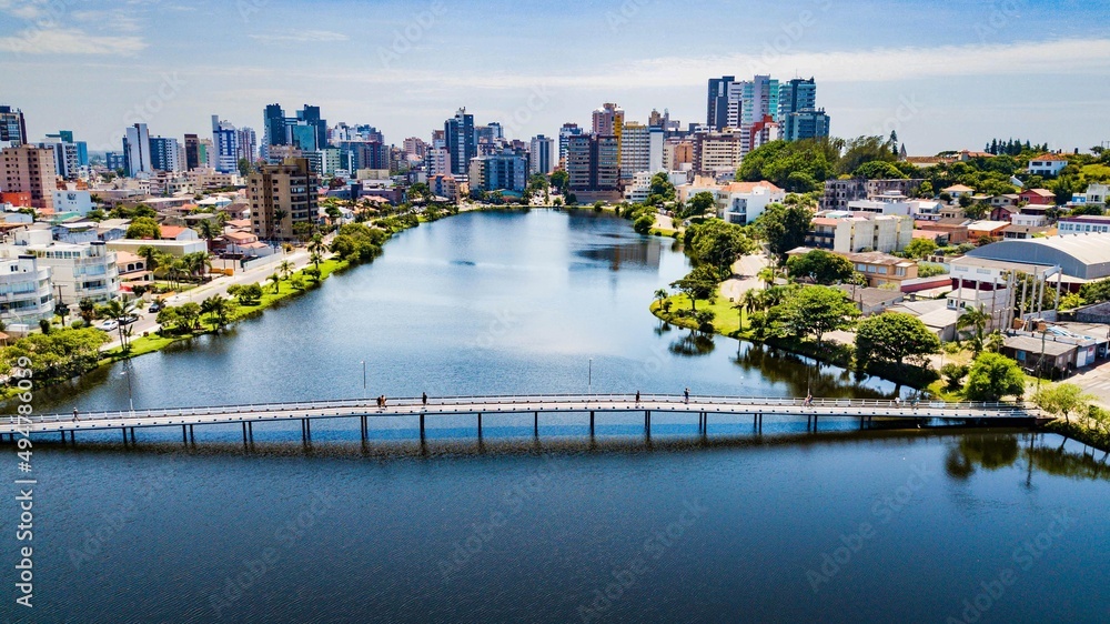 Fototapeta premium Torres RS - Aerial view of the Lagoa do Violão and the city of Torres in the background