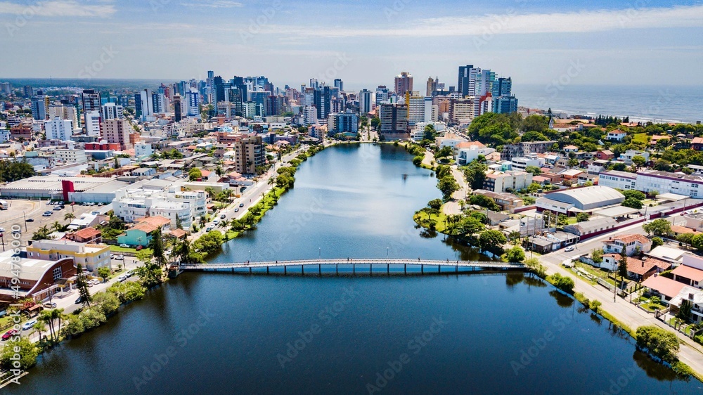 Torres RS - Aerial view of the Lagoa do Violão and the city of Torres in the background