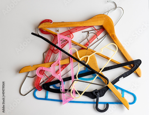 A wide variety of mixed hangers on white background photo