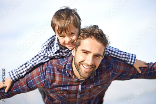 Ill always be there to carry him. Shjot of a father and son enjoying a day outdoors.