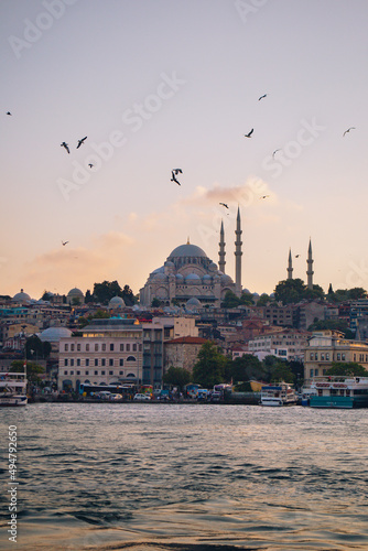 Panoramic photo taken from the river to the Blue Mosque at sunset in Istanbul Turkey