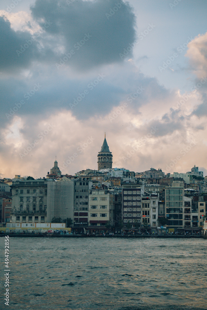 Panoramic photo of Galata Tower at sunset in Istanbul Turkey