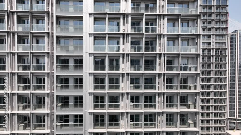 Drone aerial view of Modern dense apartment building in construction. Business, real estate and construction industry concept b-roll footage. Crowded skyscraper in construction in Shanghai China Drone aerial view of Modern dense apartment building in construction. Business, real estate and construction industry concept b-roll footage. Crowded skyscraper in construction in Shanghai China