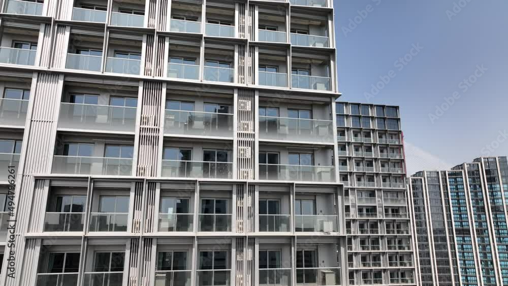 Drone aerial view of Modern dense apartment building in construction. Business, real estate and construction industry concept b-roll footage. Crowded skyscraper in construction in Shanghai China Drone aerial view of Modern dense apartment building in construction. Business, real estate and construction industry concept b-roll footage. Crowded skyscraper in construction in Shanghai China