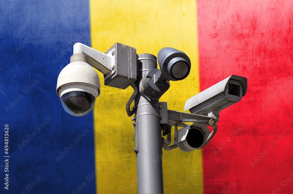 Closed circuit camera Multi-angle CCTV system against the background of the national flag of Romania.