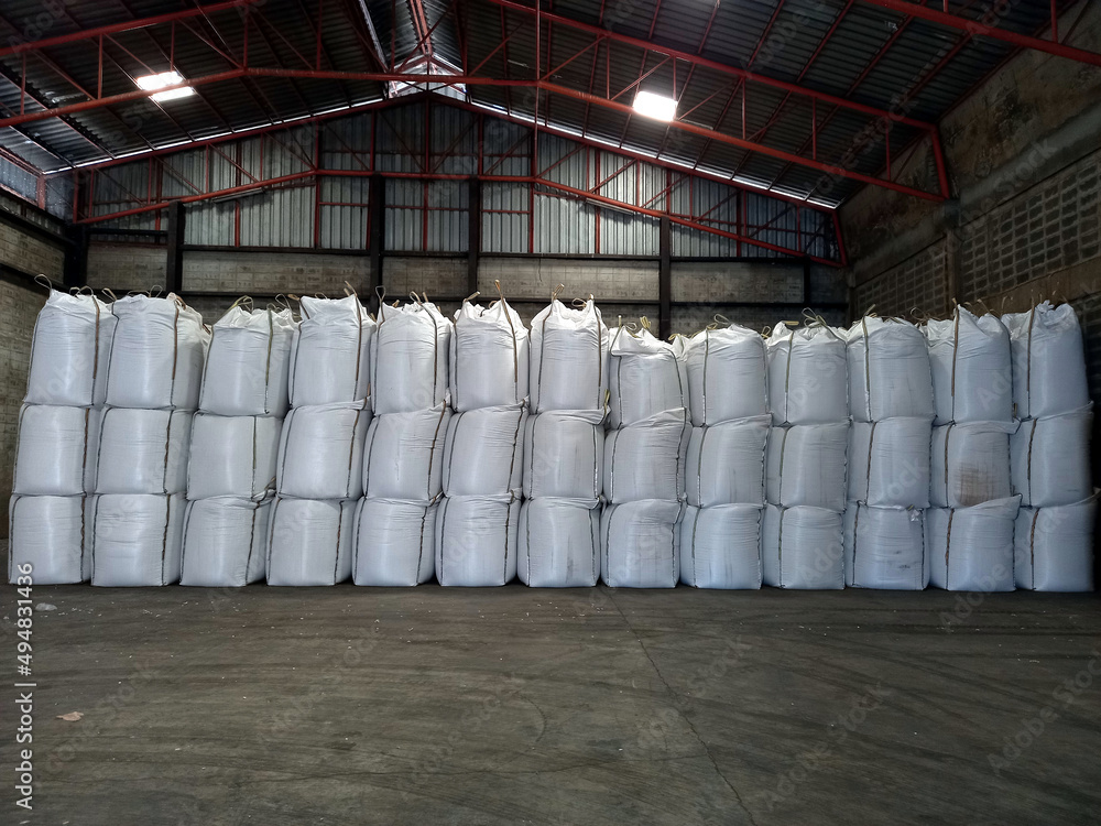 Chemical fertilizer Urea Stockpile jumbo-bag in a warehouse waiting for shipment Chemical fertilizer Urea Stockpile jumbo-bag in a warehouse waiting for shipment