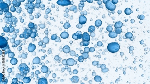 Drops of blue hypochlorous acid are swirling in clear liquid on white background | Abstract body care cosmetics with hypochlorous acid formulating concept