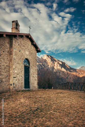 church in the mountains over lake como in italy