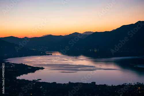 panorama view on the mountains over the lake iseo in italy at sunset
