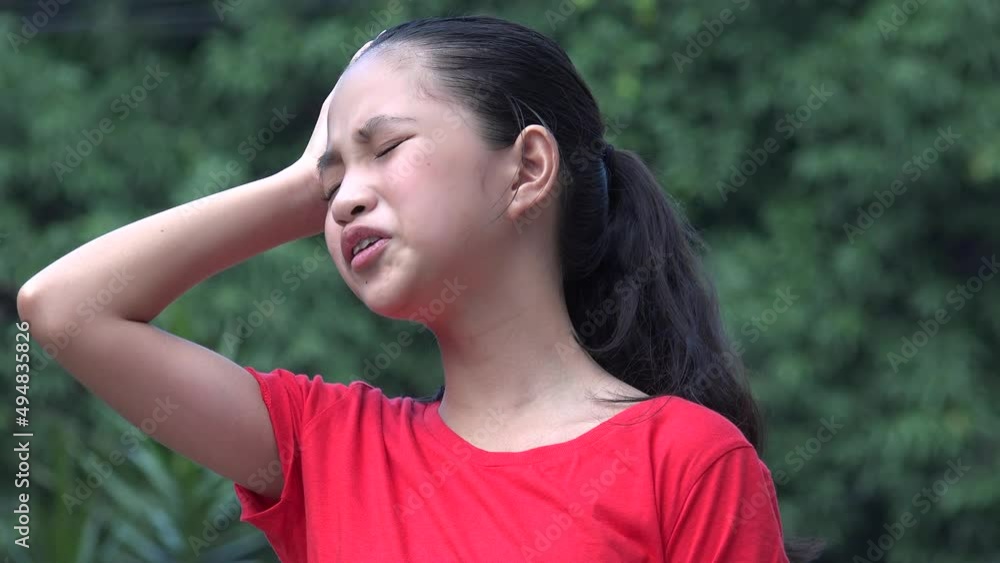 An Asian Girl Stress Or Headache An Asian Girl Stress Or Headache