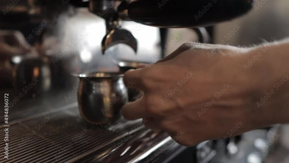 barista prepares espresso and cappuccino in a professional coffee machine barista prepares espresso and cappuccino in a professional coffee machine