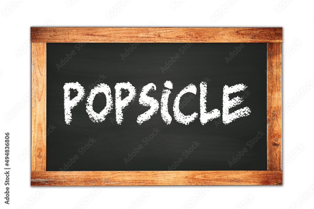 Fototapeta premium POPSICLE text written on wooden frame school blackboard.
